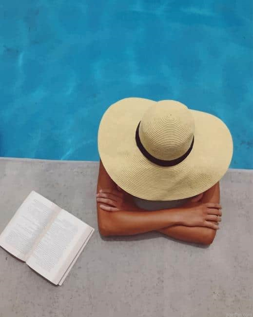 Woman Sitting In A Swimming Pool In A Large Sunhat New Paint By Numbers.png